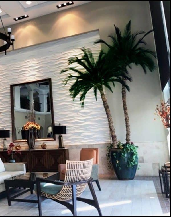 Fake palm trees indoor in a hotel lobby