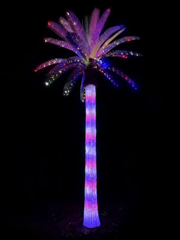 lighted-outdoor-artificial-palm-tree-4th-of-july-red-white-blue-glowing Glowing red, white, and blue 4th of July lighted outdoor artificial palm tree at dusk